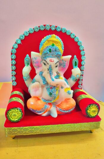 "Decorative Lord Ganesha Idol on Red Throne"