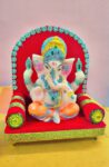 "Decorative Lord Ganesha Idol on Red Throne"
