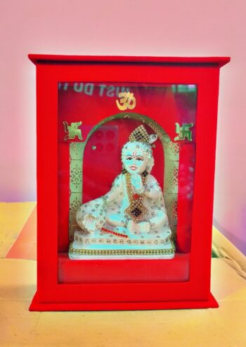 Divine Laddu Gopal Ji Idol in Red Frame | Decorative & Spiritual Showpiece